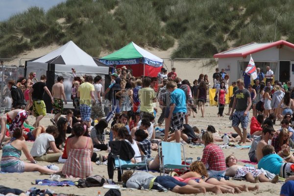 sunbathing on the beach at Beach bREAK lIVE