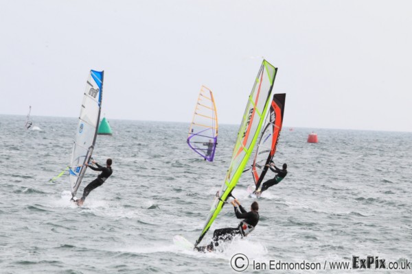 Windsurfers leave the windfest beach