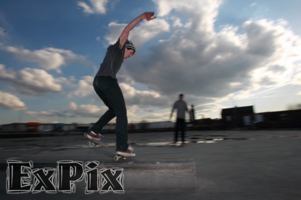 skateboarder nose grind on kirb stone in rochdale