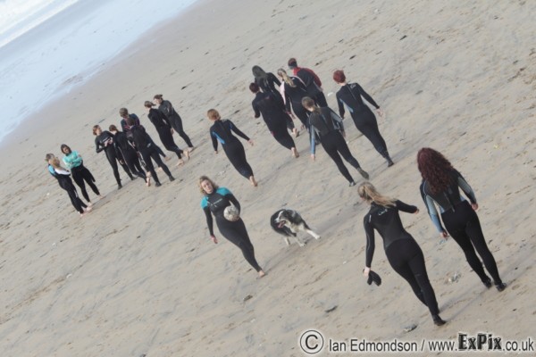 girls on watergate bay beach